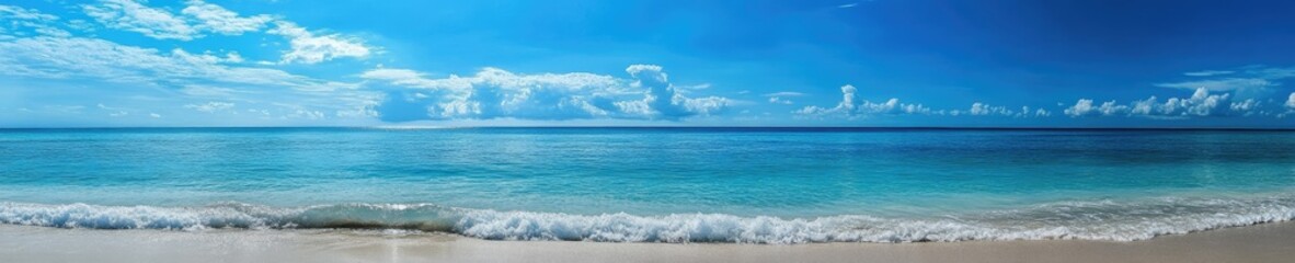 Tranquil Beach View with Gentle Waves and Clear Sky