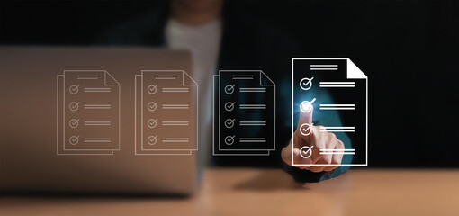 Concept of electronically checking smart items and documents on a virtual screen. Businessman...