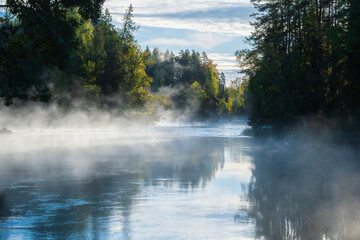 Naklejka premium River landscape at sunrise. Farnebofjarden national park in north of Sweden.