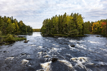 River landscape at sunrise. Farnebofjarden national park in north of Sweden.
