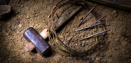 Rusty nails and a wreath of thorns at the cross
