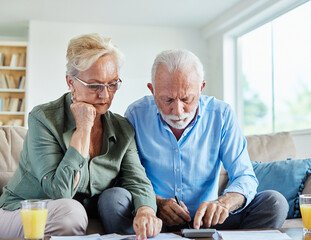 woman man senior bill finance retirement couple home document calculator paper wife  budget elderly...