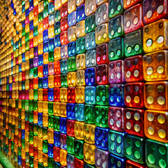 Fototapeta premium a wall is made of colored dice