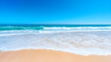 Fototapeta premium Ocean Waves Crashing on Sandy Beach