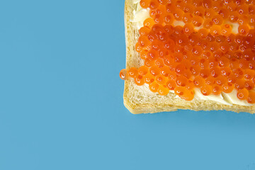 red caviar on a blue background