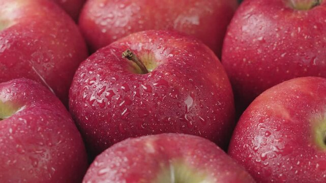 close up of fresh red delicious apples background.