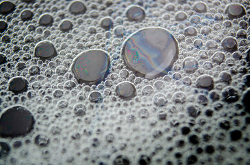 Air bubbles trapped inside a gel-like transparent substance.