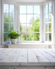 Fototapeta premium in the foreground there is a close-up of a white wooden table, in the background there is a blurry background of a large window with a beautiful view and a potted plant on the windowsill