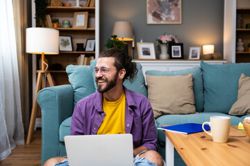 Career winner mindset. Young freelance businessman working at home. Confident dedicated male learning and educate himself for better opportunity in his business career, work on laptop computer.