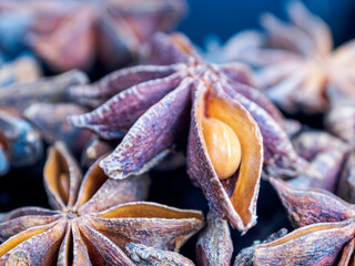 A close-up of anise seeds, highlighting their texture and nuances, is ideal for illustration of spices and cooking