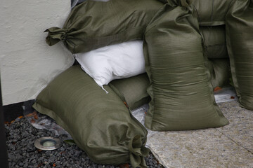 Sandbags outside building because of flooding