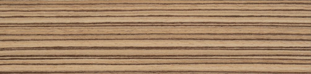 Natural Zebrano veneer showcases rich brown hues with distinctive dark streaks, adding a touch of...