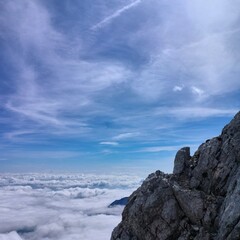 epic rocks in mountains with cloudy background