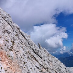epic rocks in mountains with cloudy background