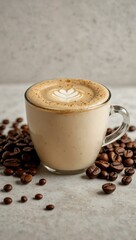Creamy coffee with beans against a white backdrop.