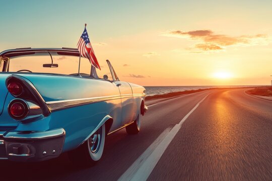 Vintage Convertible Car With American Flag Driving Into Sunset On Coastal Highway - Powered by Adobe