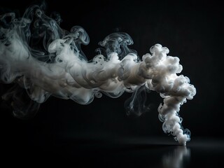 White smoke floating gracefully on a dark background.