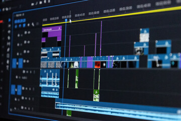 Closing the video editing timeline and the computer monitor while the video editor works on video...