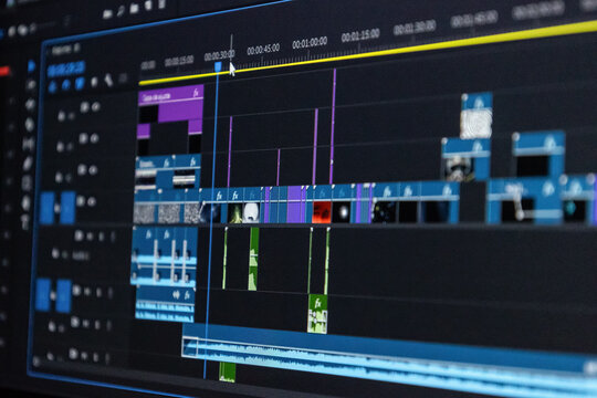 Closing the video editing timeline and the computer monitor while the video editor works on video editing on the computer. fixed programme work for editing, processing, post-production, clip creation