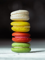 colorful macaroons isolated on black
