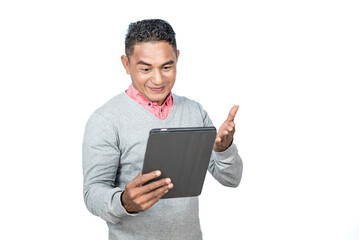 Fototapeta na wymiar Cheerful expression of a man while holding a tablet isolated on a white background