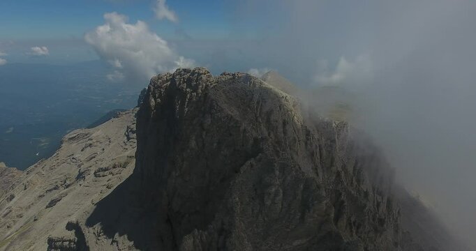 Top of Mount Olympus in Greece. Aerial panoramic view of the imposing highest peak of Mitikas and the wider area at Mount Olympus in Greece.