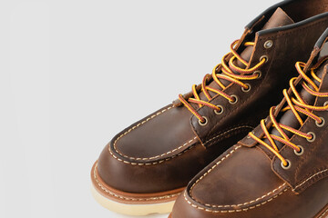 Brown leather boots on white background. Fashion
