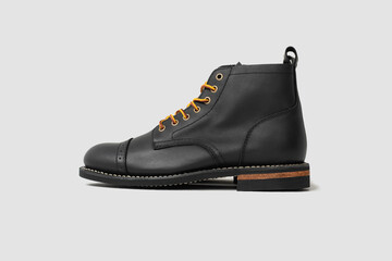 Black leather boots on white background. Fashion 
