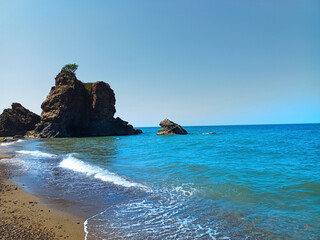 Beach and rocks in the sea