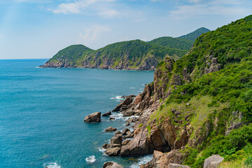 Fototapeta premium Rocks on a rocky shore.The South China Sea in the East of Vietnam. Hoa Tam Commune, Long Hoa District, Fuyen Province. 