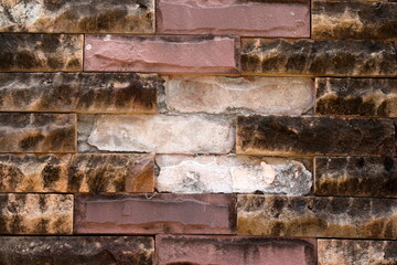 The walls have black stains, dirt, and damage.