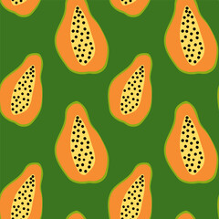 Colorful papaya pattern on a green background with vibrant yellow and black seeds