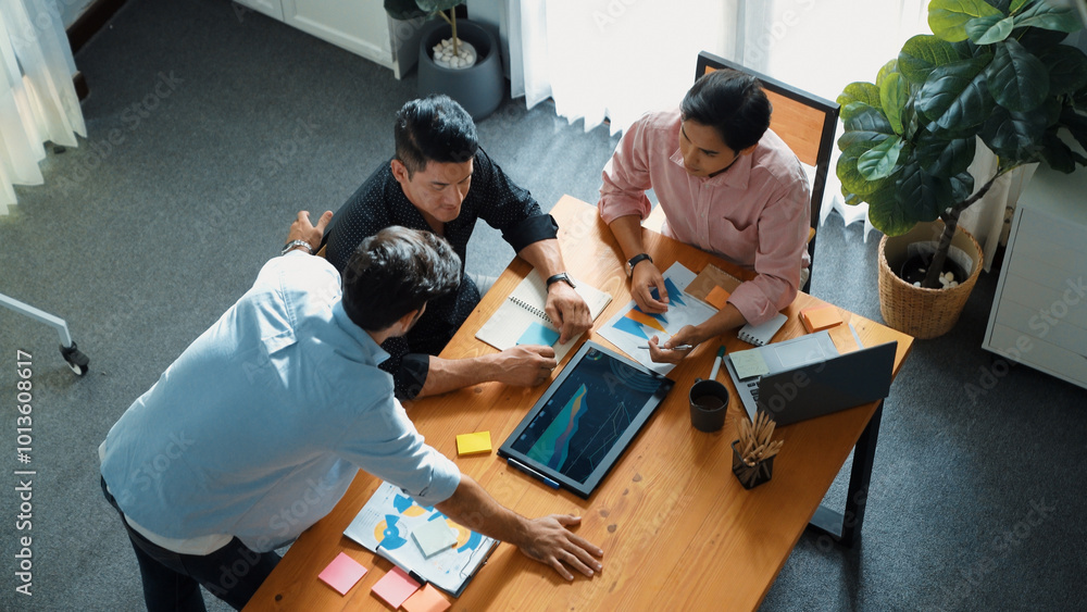 Poster group of diverse people sharing idea while writing at sticky notes. professional smart business team