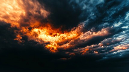 Dramatic Sunset Sky with Dark and Orange Clouds