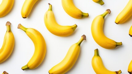 A pattern of ripe yellow bananas on a white background.
