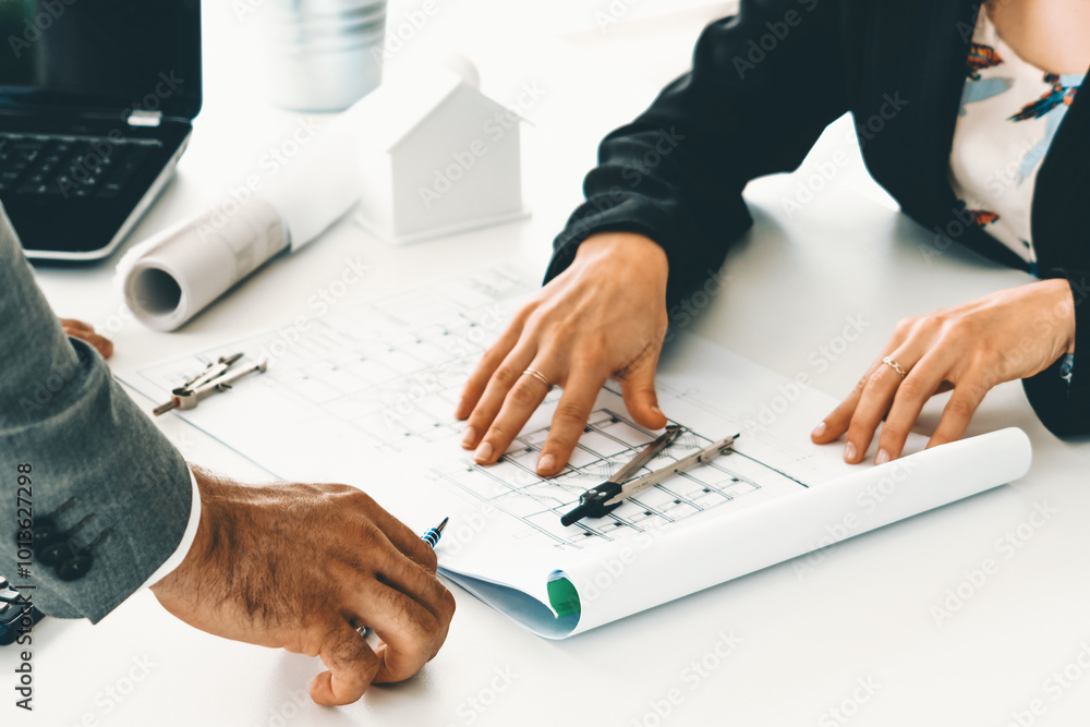 Poster architect and engineer working with construction drawing project on table in office. architecture an