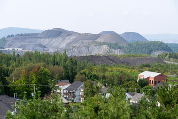 Asbestos mine wastes near a town