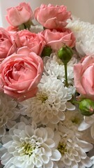 A beautiful bouquet of white asters and pink roses
