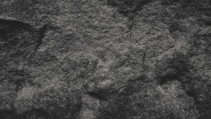 Dark stone texture. Grey stone background. Natural rock surface.