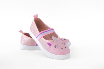 kids bright pink glitter unicorn shoes for girls isolated photo on white background