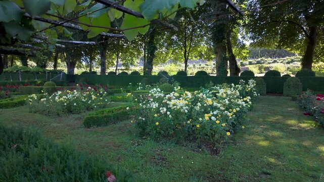 Stunning gardens of the Pazo de Oca while the water sprinklers irrigate in the morning.