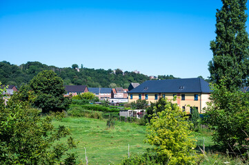 Detached country houses at the green Walloon countryside in Oupeye, Liège, Belgium