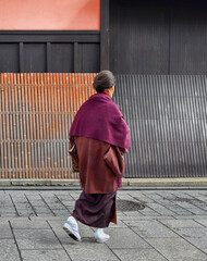 Japanese lady walking at Gion district in Kyoto, Japan. 