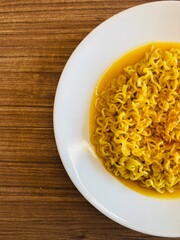 white plate with Maggie on desk