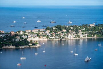Yachts at anchor off Presqu'ile du Cap Ferrat on French Riviera, France on sunny summer afternoon.