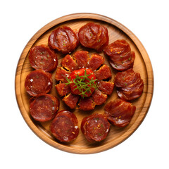 Top view of a delicious looking sliced chorizo arranged food photography style on a wooden tray isolated on a white transparent background