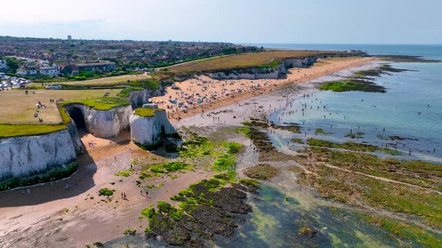 Aerial view of Kingsgate Bay, a sheltered sandy cove backed by high white chalk cliffs, Kent, England, UK