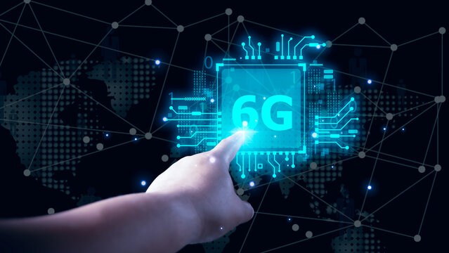 Businessman pointing at futuristic 6g technology and futuristic advancement, future technology 6G network internet of thinks connection communication, high-speed internet network signal.