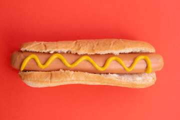 Hot dog with yellow mustard