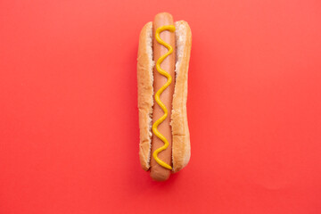 Hot dog with yellow mustard